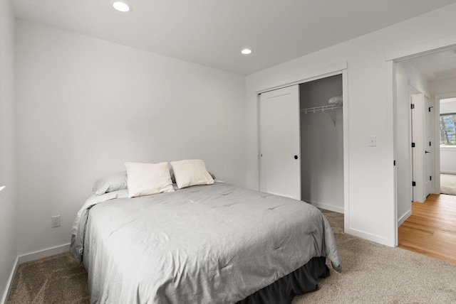 100 Bench Run, Columbia Falls, MT 59912 - bedroom with light colored carpet, recessed lighting, baseboards, and a closet