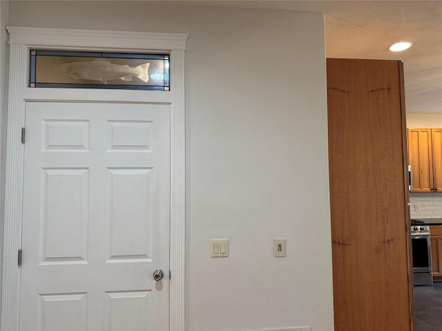 638 Trestle Creek Dr, Saint Regis, MT 59866 - detailed view of gas range, recessed lighting, and tasteful backsplash