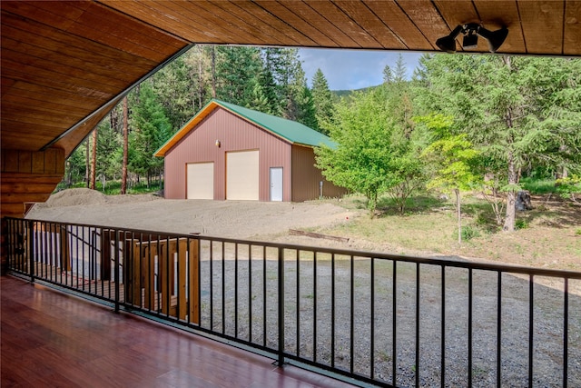 104 Swede Gulch Rd, Libby, MT 59923 - view of patio / terrace featuring a detached garage, an outdoor structure, and a ceiling fan