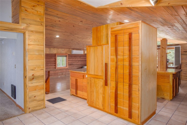 104 Swede Gulch Rd, Libby, MT 59923 - kitchen featuring wooden ceiling, wooden walls, vaulted ceiling, recessed lighting, and light tile patterned floors