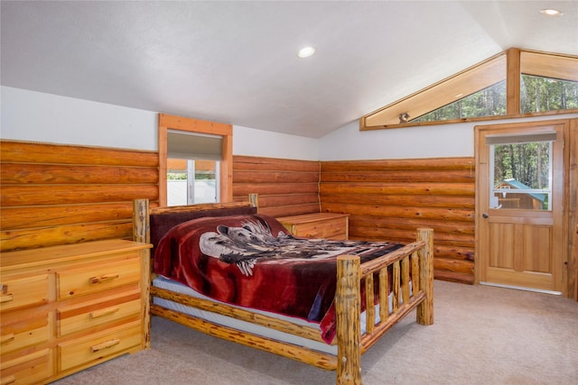104 Swede Gulch Rd, Libby, MT 59923 - bedroom with log walls, vaulted ceiling, light carpet, and recessed lighting