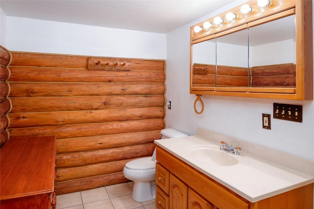 104 Swede Gulch Rd, Libby, MT 59923 - bathroom featuring rustic walls, vanity, toilet, and tile patterned flooring