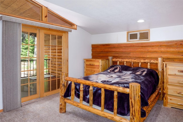 104 Swede Gulch Rd, Libby, MT 59923 - carpeted bedroom featuring log walls, access to exterior, and recessed lighting