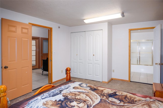 104 Swede Gulch Rd, Libby, MT 59923 - carpeted bedroom with a closet, baseboards, and ensuite bath