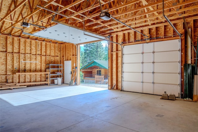 104 Swede Gulch Rd, Libby, MT 59923 - garage featuring a garage door opener