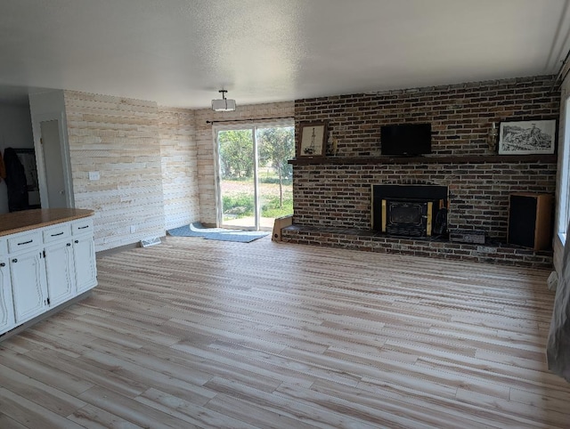 11 City Shop Rd, Shelby, MT 59474 - unfurnished living room with light wood-style flooring