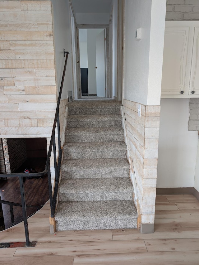 11 City Shop Rd, Shelby, MT 59474 - stairs featuring wood finished floors