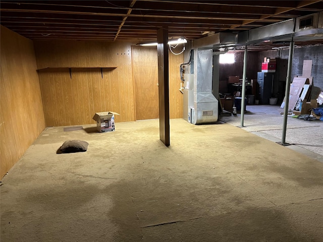 130 Sequist St, Simms, MT 59477 - unfinished basement featuring carpet floors, heating unit, and wooden walls