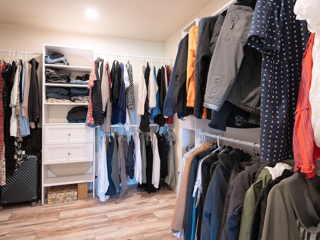871 Conrad Dr, Kalispell, MT 59901 - walk in closet featuring wood finished floors