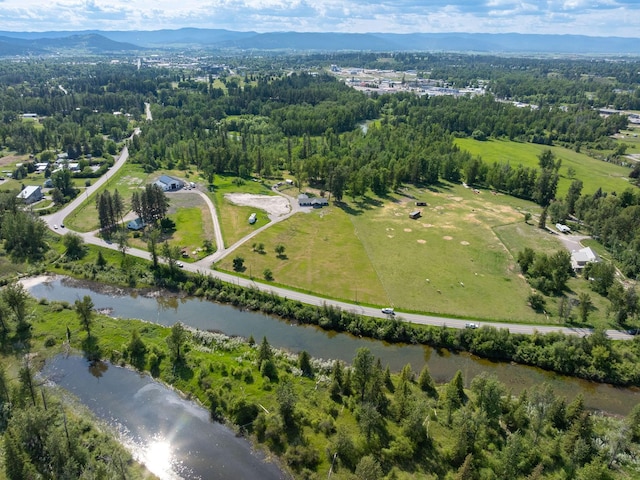 871 Conrad Dr, Kalispell, MT 59901 - aerial view of property and surrounding area with a water and mountain view