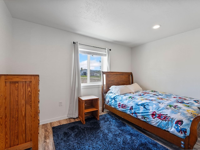 871 Conrad Dr, Kalispell, MT 59901 - bedroom with light wood-style flooring, baseboards, and recessed lighting