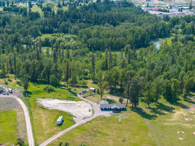 871 Conrad Dr, Kalispell, MT 59901 - aerial view of property's location featuring a forest