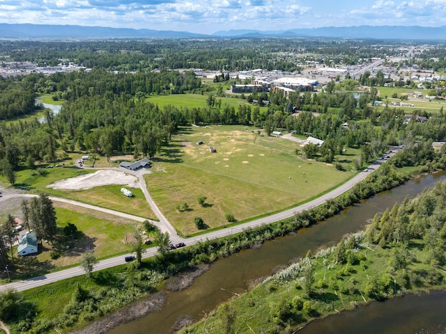 871 Conrad Dr, Kalispell, MT 59901 - aerial view of property's location featuring a water and mountain view