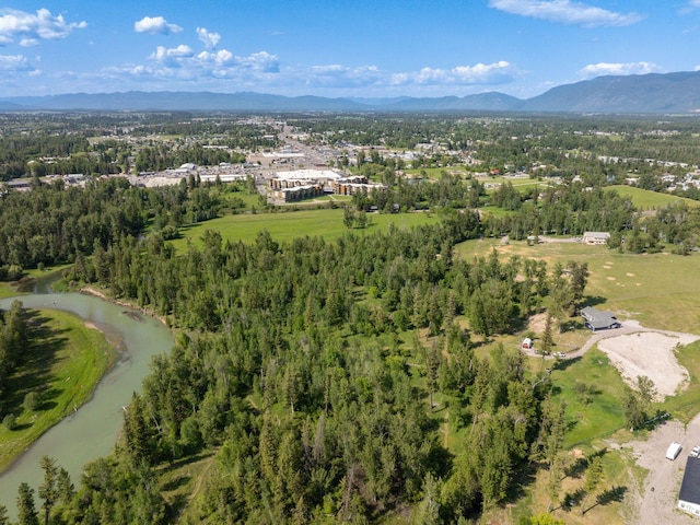 871 Conrad Dr, Kalispell, MT 59901 - aerial view of property and surrounding area with mountains
