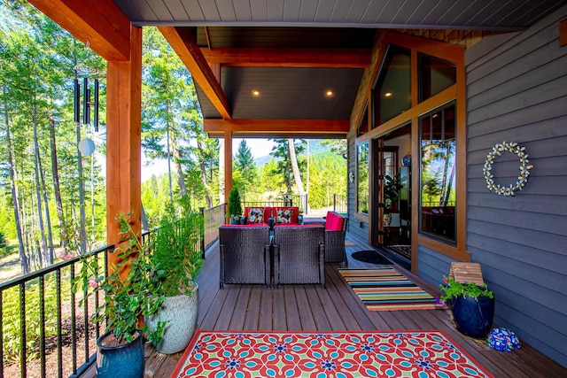 2475 E Lakeshore Dr, Whitefish, MT 59937 - wooden deck with outdoor dining space