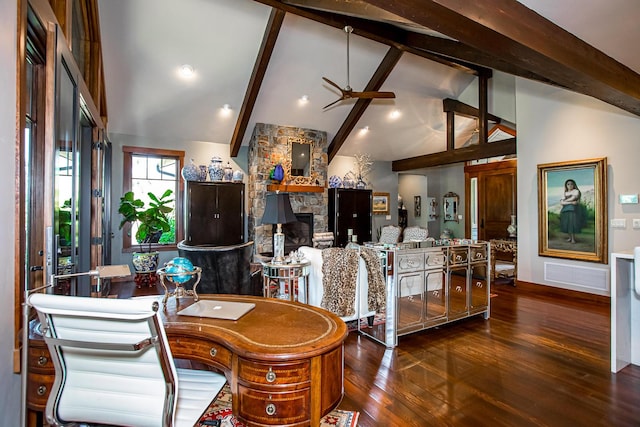 2475 E Lakeshore Dr, Whitefish, MT 59937 - living area with wood finished floors, beam ceiling, high vaulted ceiling, a ceiling fan, and a stone fireplace