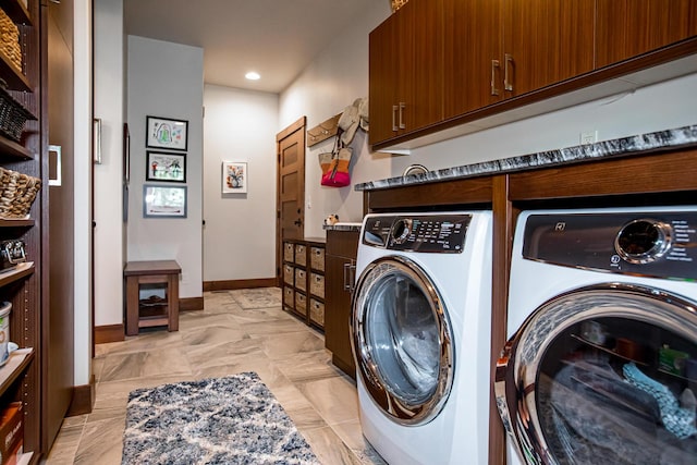 2475 E Lakeshore Dr, Whitefish, MT 59937 - washroom featuring independent washer and dryer, cabinet space, baseboards, and recessed lighting