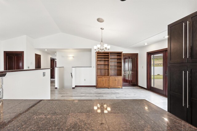 116 Windameer Ct, Butte, MT 59701 - unfurnished living room featuring lofted ceiling, a chandelier, and recessed lighting