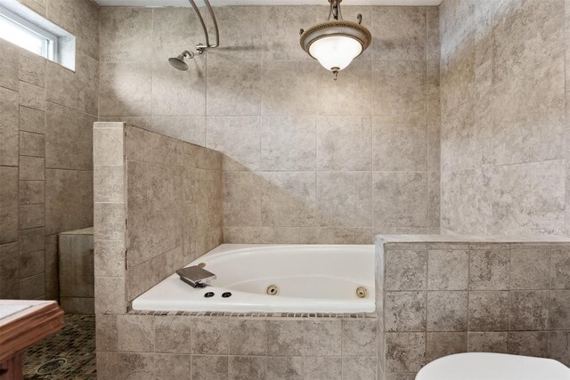 116 Windameer Ct, Butte, MT 59701 - bathroom featuring a whirlpool tub, toilet, a tile shower, and tile walls