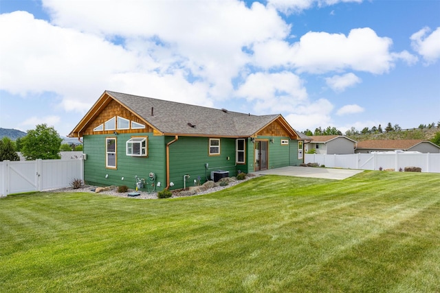 116 Windameer Ct, Butte, MT 59701 - back of property featuring a gate, a patio, and a shingled roof
