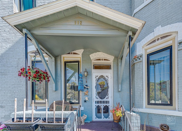 902 N Park Ave, Helena, MT 59601 - doorway to property with brick siding and covered porch