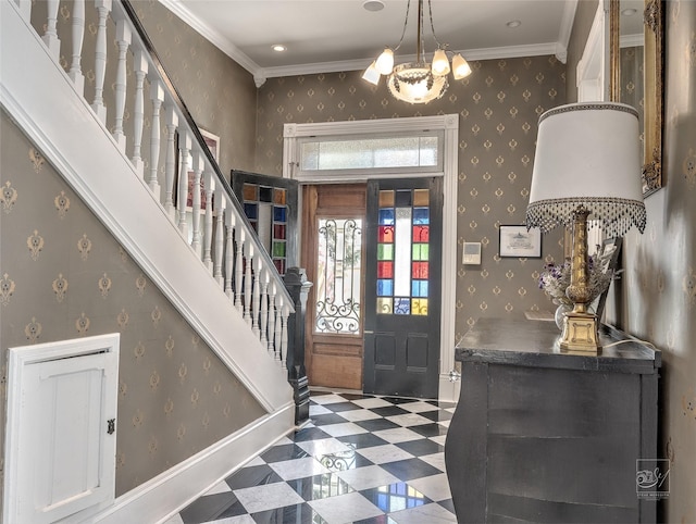 902 N Park Ave, Helena, MT 59601 - foyer with tile patterned floors, stairs, a chandelier, and ornamental molding