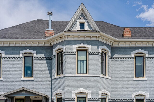 902 N Park Ave, Helena, MT 59601 - view of side of home featuring brick siding