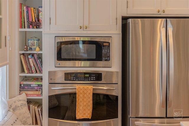 902 N Park Ave, Helena, MT 59601 - kitchen view of appliances with stainless steel finishes and white cabinetry