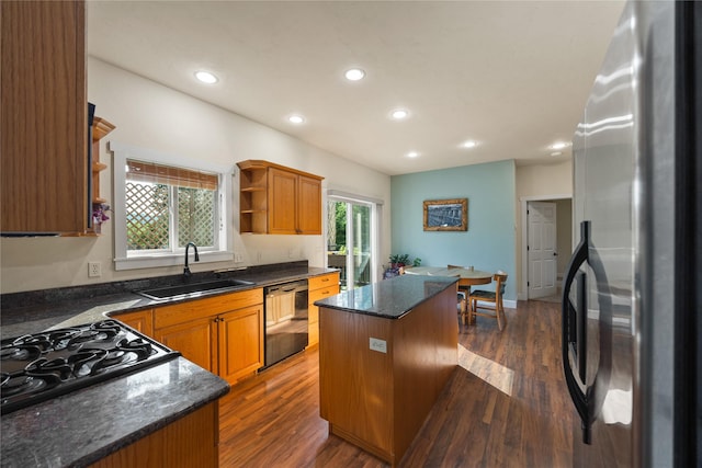 13471 Sundance Trl, Bigfork, MT 59911 - kitchen with freestanding refrigerator, open shelves, black dishwasher, a kitchen island, and recessed lighting