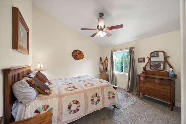 13471 Sundance Trl, Bigfork, MT 59911 - carpeted bedroom featuring vaulted ceiling and a ceiling fan