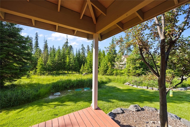 13471 Sundance Trl, Bigfork, MT 59911 - deck featuring a lawn