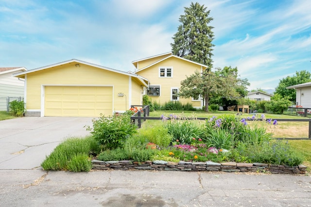 2606 View Dr, Missoula, MT 59804 - view of front of house with a garage and driveway