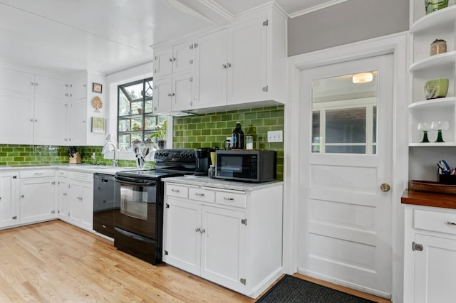 2606 View Dr, Missoula, MT 59804 - kitchen featuring black appliances, white cabinetry, a sink, and ornamental molding