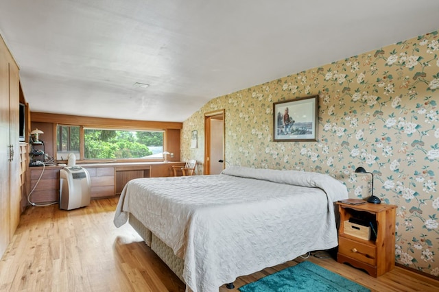 2606 View Dr, Missoula, MT 59804 - bedroom featuring wallpapered walls, light wood finished floors, and radiator