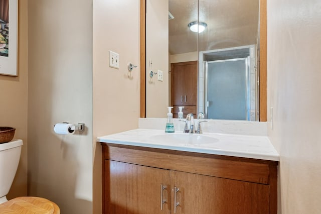 2606 View Dr, Missoula, MT 59804 - bathroom featuring toilet, vanity, and a shower with shower door