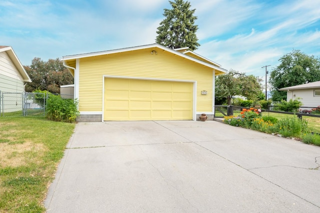 2606 View Dr, Missoula, MT 59804 - view of front of home featuring a garage, an outdoor structure, and driveway