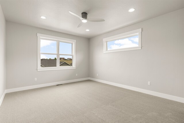 7018 Max Dr, Missoula, MT 59803 - spare room featuring ceiling fan, recessed lighting, baseboards, and light carpet