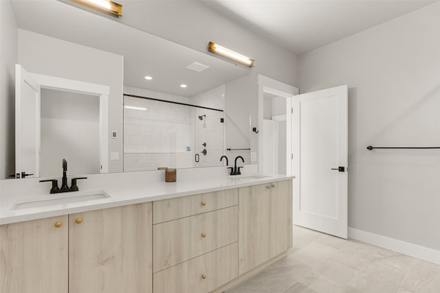 7018 Max Dr, Missoula, MT 59803 - full bath with double vanity, tiled shower, baseboards, and recessed lighting