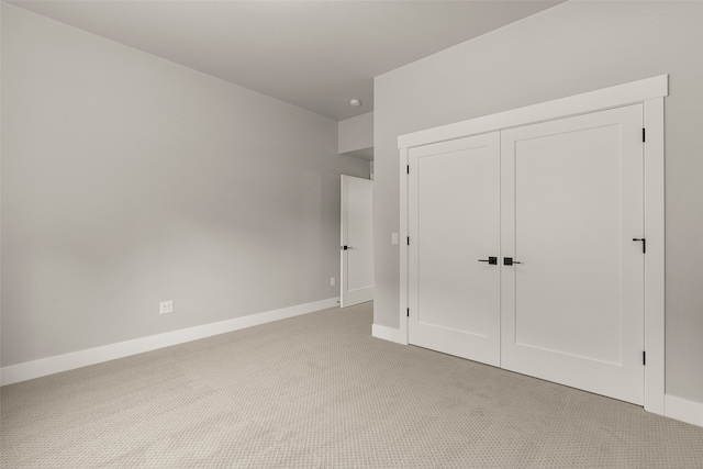 7018 Max Dr, Missoula, MT 59803 - unfurnished bedroom featuring light colored carpet, a closet, and baseboards