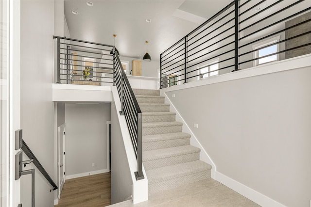 7018 Max Dr, Missoula, MT 59803 - staircase with baseboards, recessed lighting, and a high ceiling