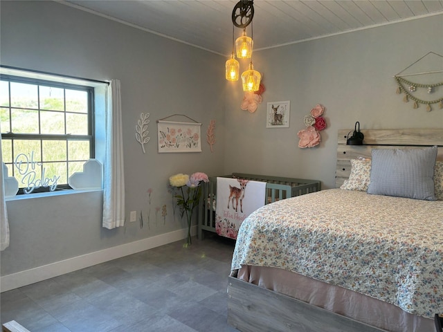 411 10th Ave NE, Choteau, MT 59422 - bedroom with baseboards and ornamental molding