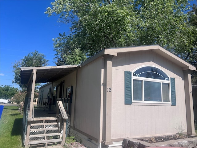 3000 Villard Ave Unit 12, Helena, MT 59601 - view of home's exterior featuring covered porch and crawl space