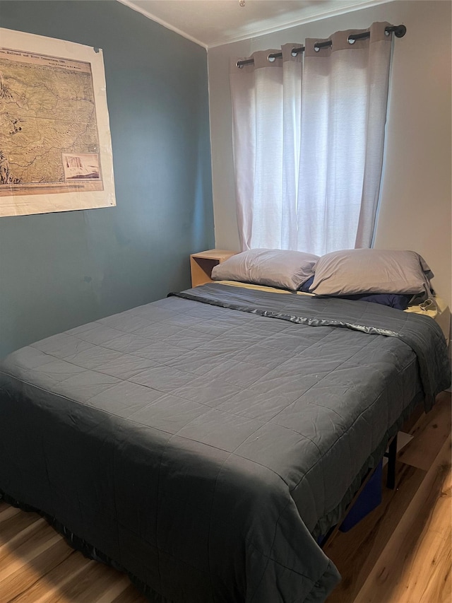 3000 Villard Ave Unit 12, Helena, MT 59601 - bedroom with wood finished floors and ornamental molding