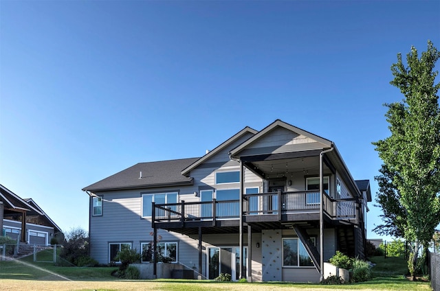4995 Jeff Dr, Missoula, MT 59803 - back of house featuring a deck and a yard