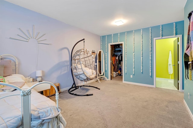 4995 Jeff Dr, Missoula, MT 59803 - bedroom with carpet, a walk in closet, a closet, and connected bathroom