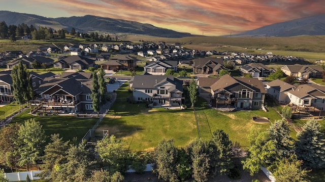4995 Jeff Dr, Missoula, MT 59803 - aerial view at dusk of a residential view and a mountain view