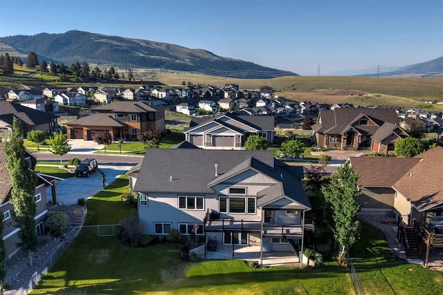 4995 Jeff Dr, Missoula, MT 59803 - aerial perspective of suburban area with a mountain backdrop