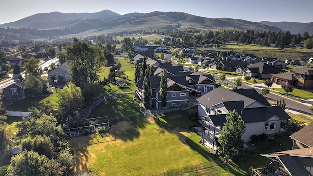 4995 Jeff Dr, Missoula, MT 59803 - aerial perspective of suburban area featuring a mountainous background