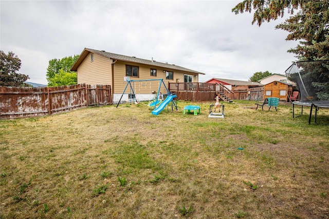 5900 Longview Dr, Missoula, MT 59803 - view of yard with a trampoline and a playground