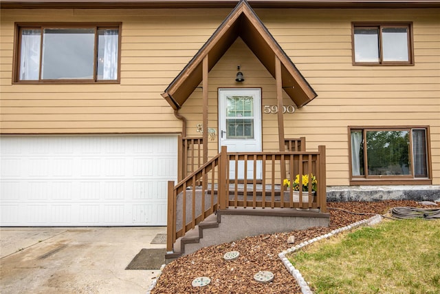 5900 Longview Dr, Missoula, MT 59803 - view of front facade with an attached garage and concrete driveway
